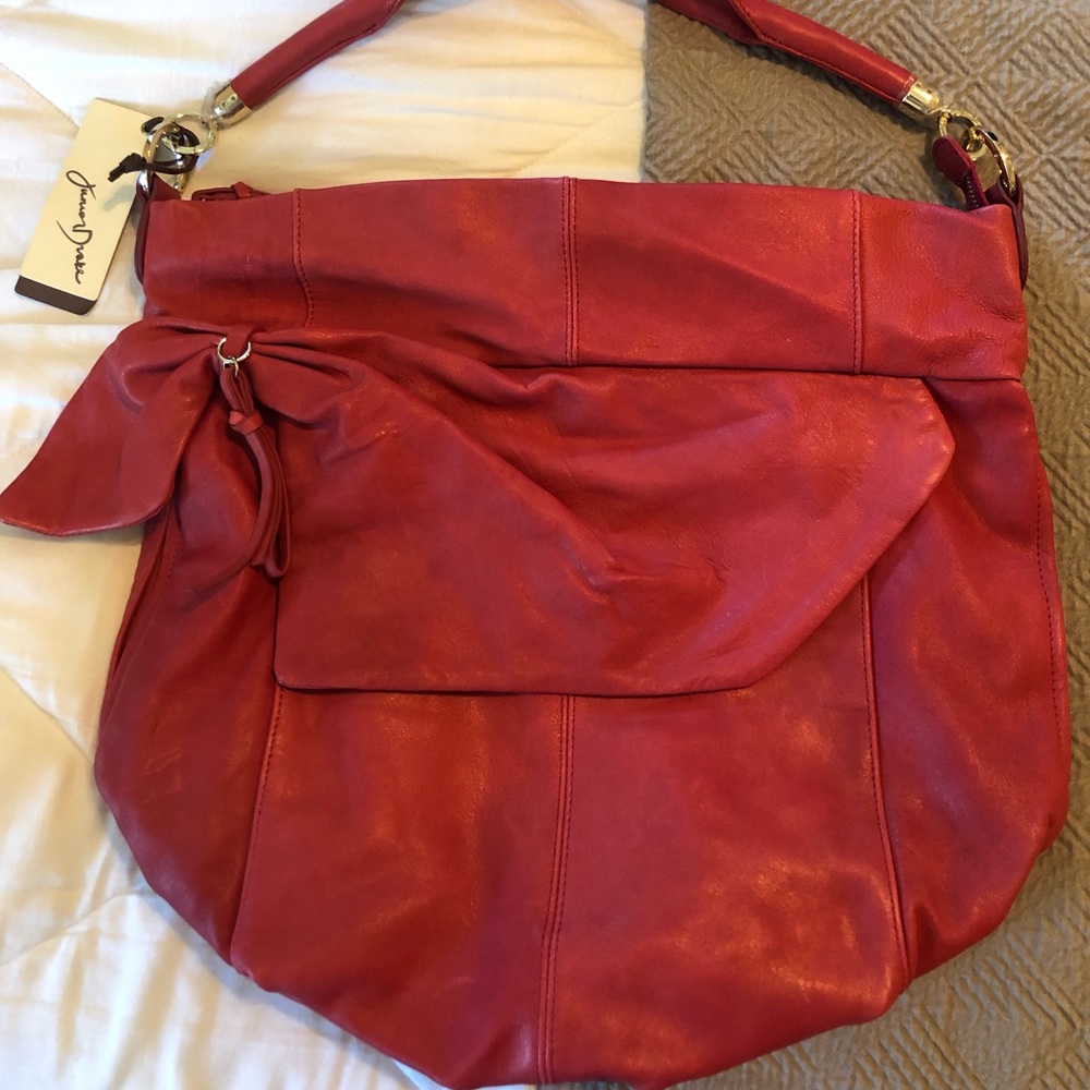 New with tags attached Junior Drake bag.